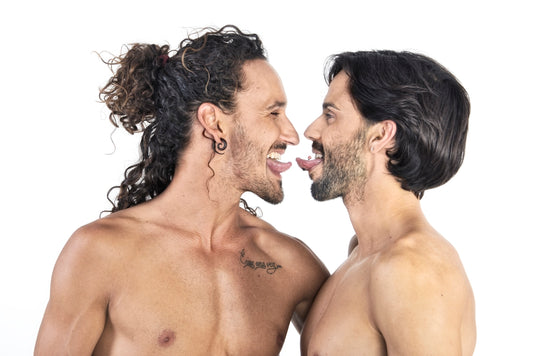 topless men with tongues out
